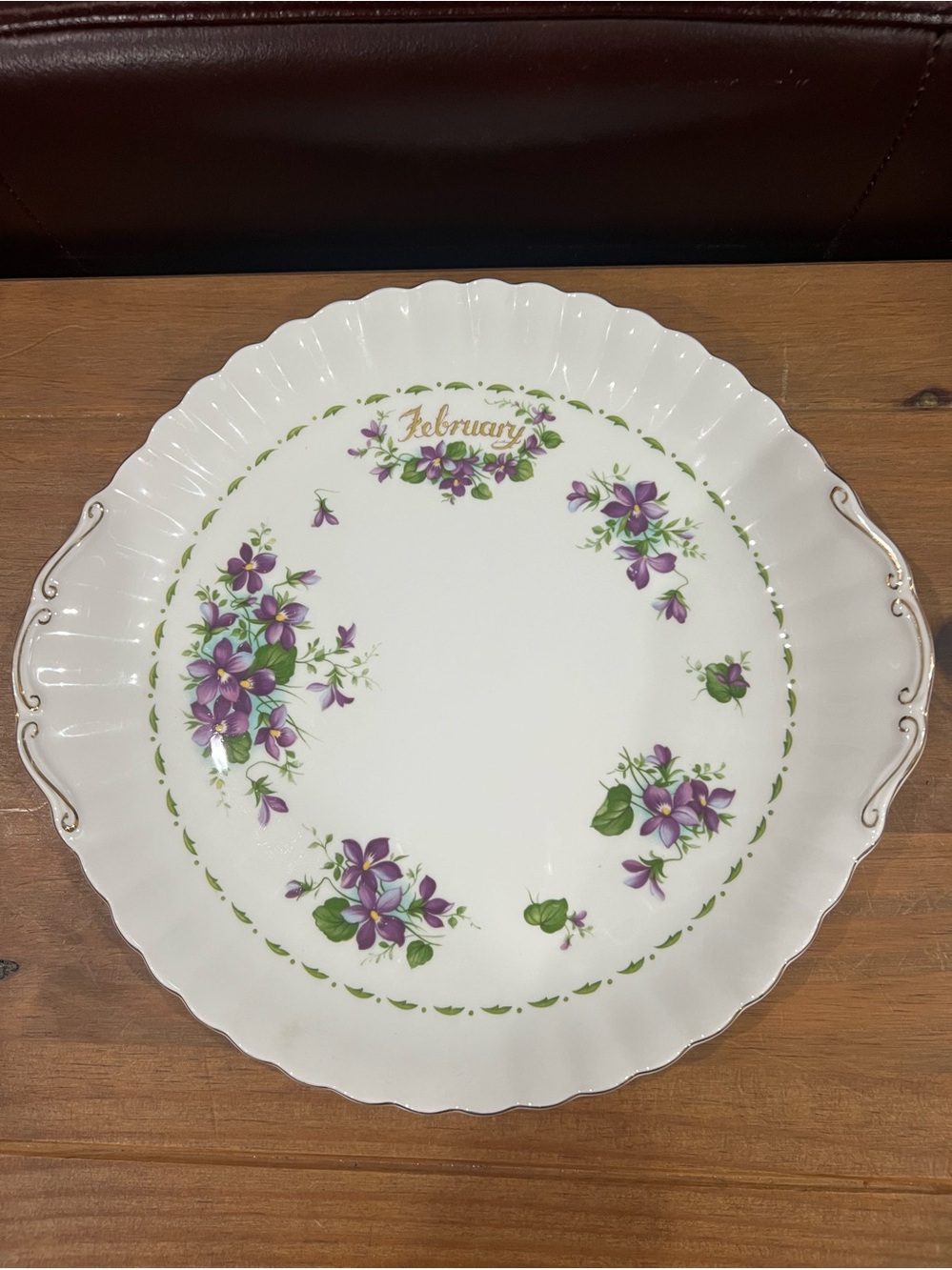 Royal Albert flower of the month.February-Violets 10 1/2” excellent condition.